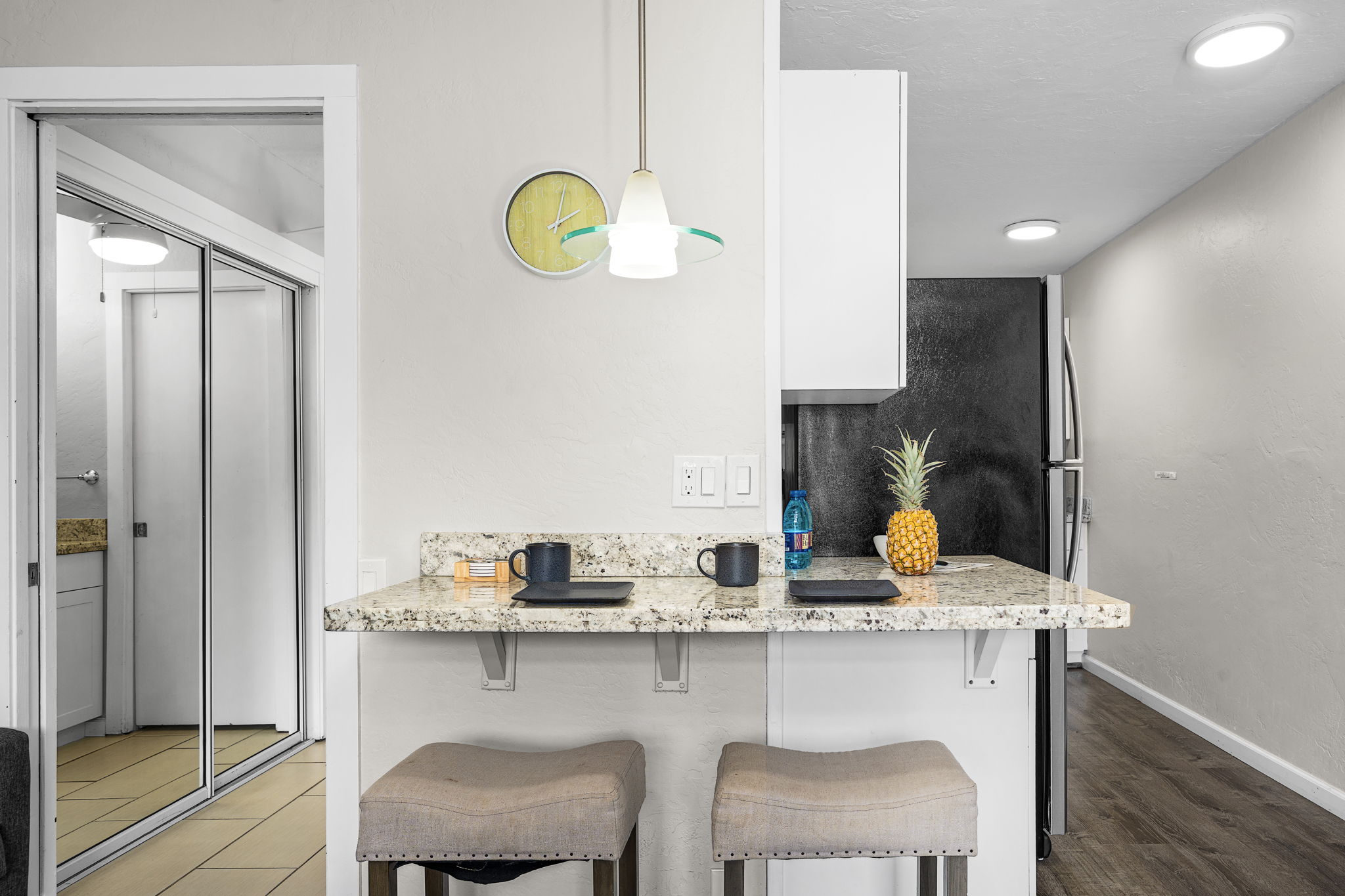 76-6233 Alii Drive, Unit 264 Kailua-Kona, HI 96740 - Photo 8 of 17 a kitchen with a sink cabinets and window