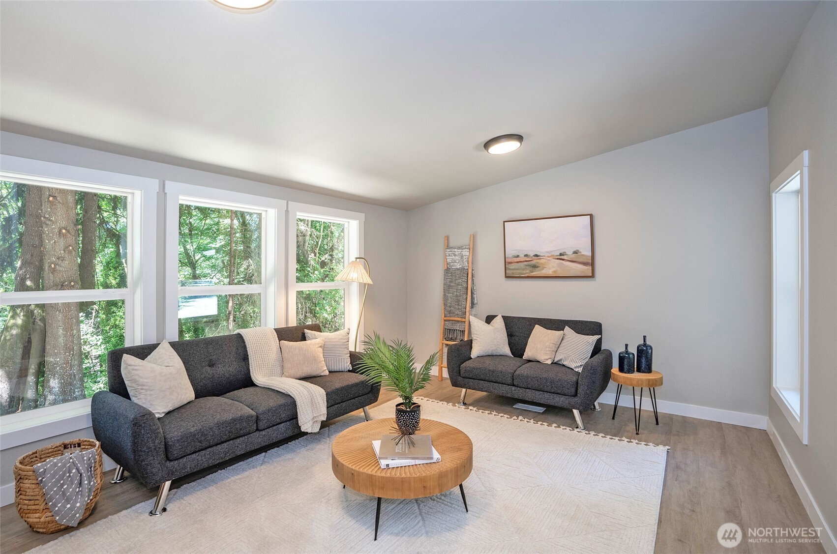 22902 Keating Road Orting, WA 98360 - Photo 18 of 40 a living room with furniture and a large window