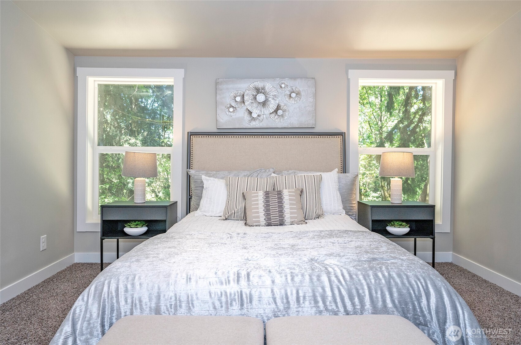 22902 Keating Road Orting, WA 98360 - Photo 22 of 40 a bedroom with a large bed and a window