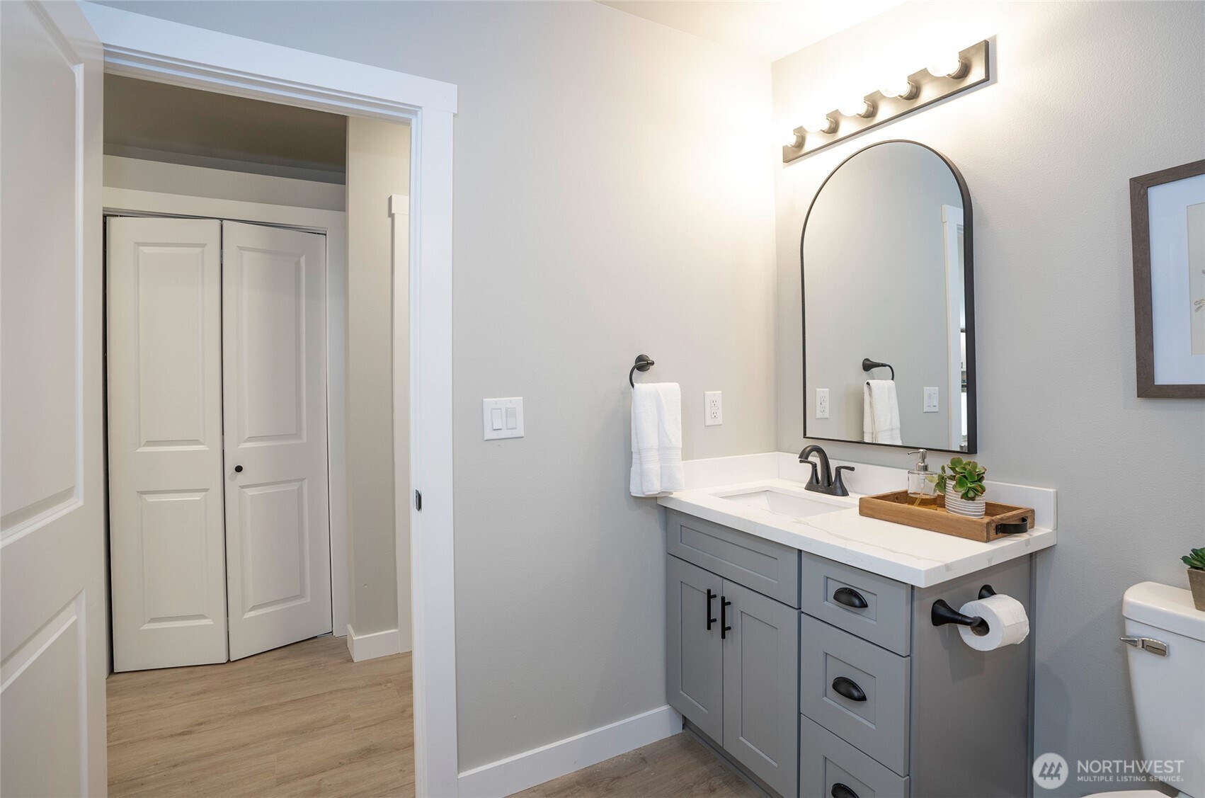 22902 Keating Road Orting, WA 98360 - Photo 27 of 40 a bathroom with a sink and a mirror