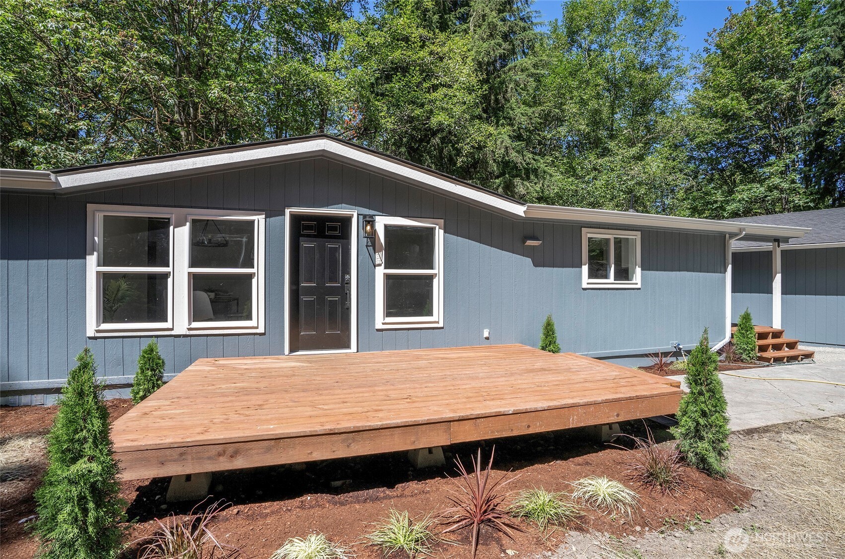 22902 Keating Road Orting, WA 98360 - Photo 5 of 40 a view of a house with backyard and sitting area