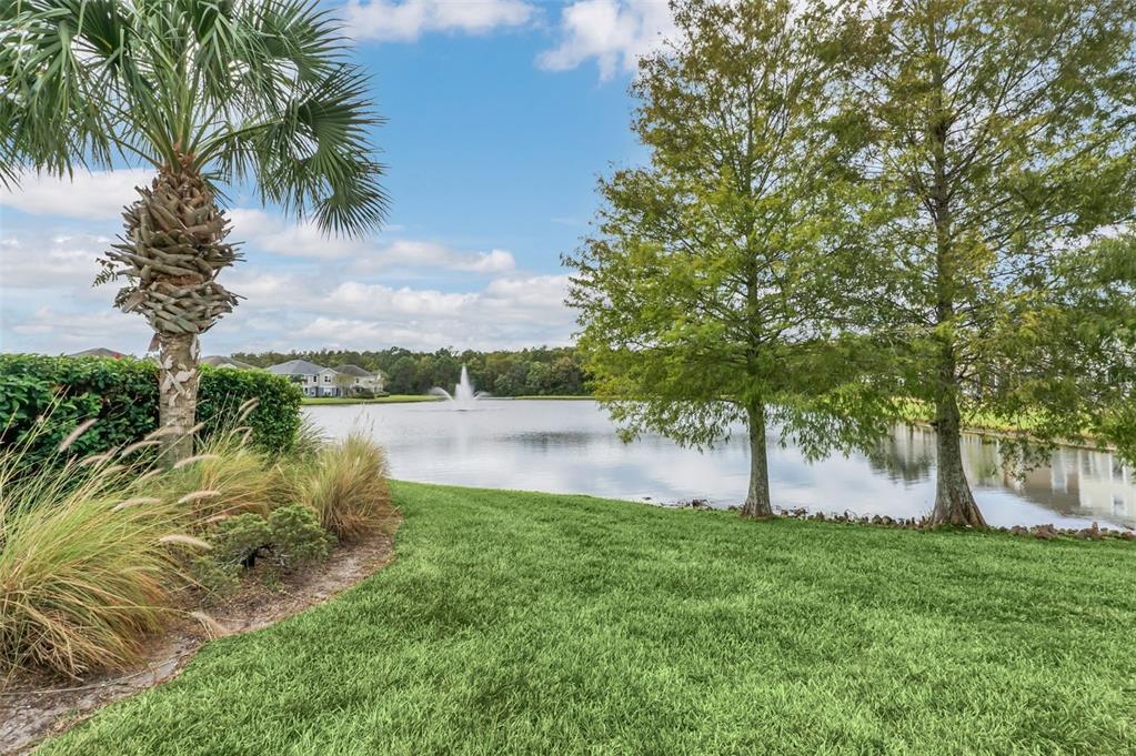 6458 South Goldenrod Road, Unit 29B Orlando, FL 32822 - Photo 40 of 40 a view of lake with green space
