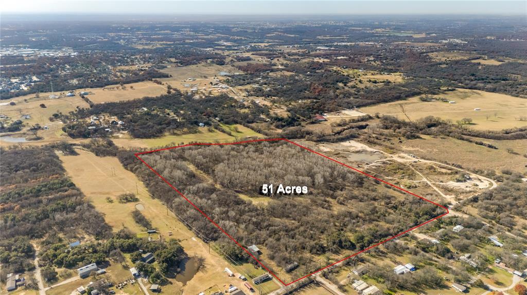 1620 West Timberlake Street, Unit A Azle, TX 76020 - Photo 6 of 12 an aerial view of residential houses with outdoor space