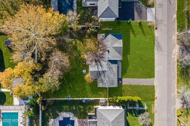 an outdoor view of garden with swimming pool