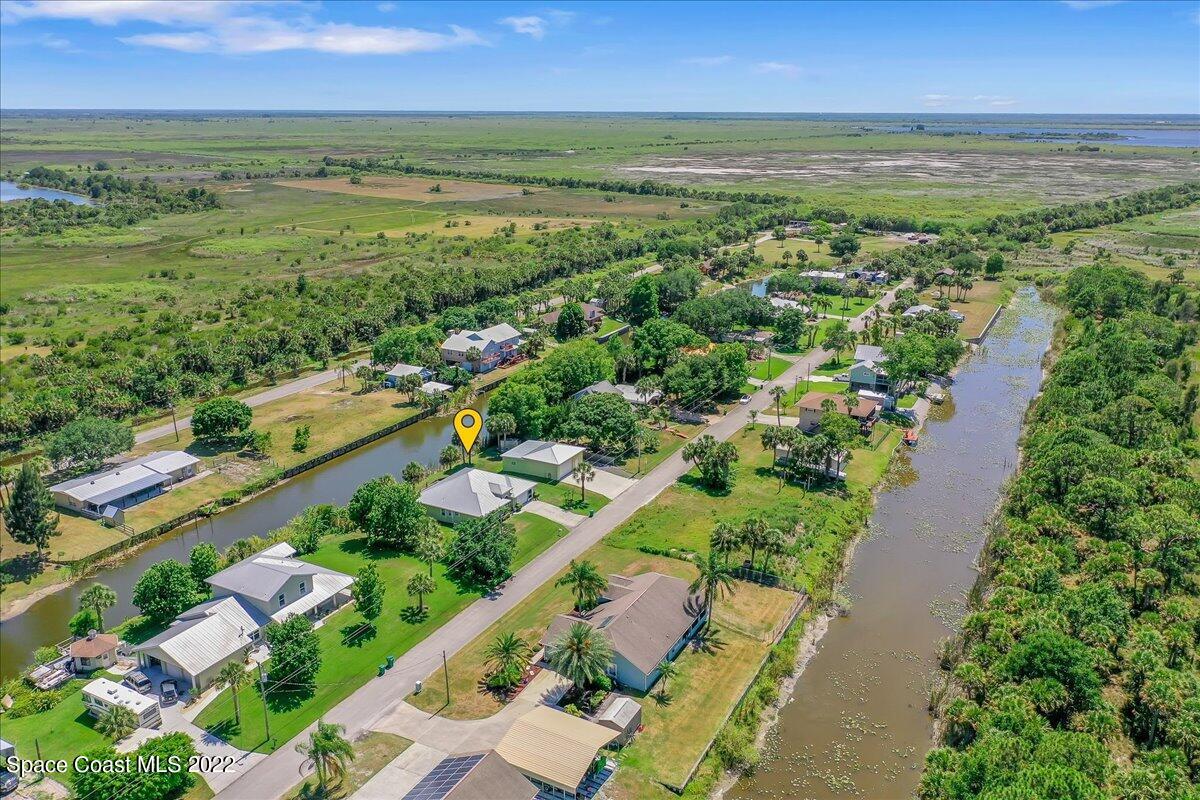 5265 Evinrude Road Melbourne, FL 32934 - Photo 3 of 42 a view of city and ocean