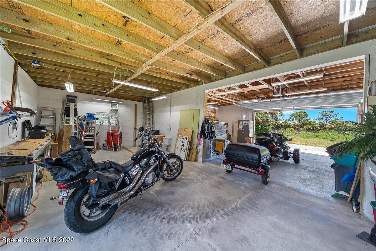 5265 Evinrude Road Melbourne, FL 32934 - Photo 34 of 42 a view of a storage room with furniture