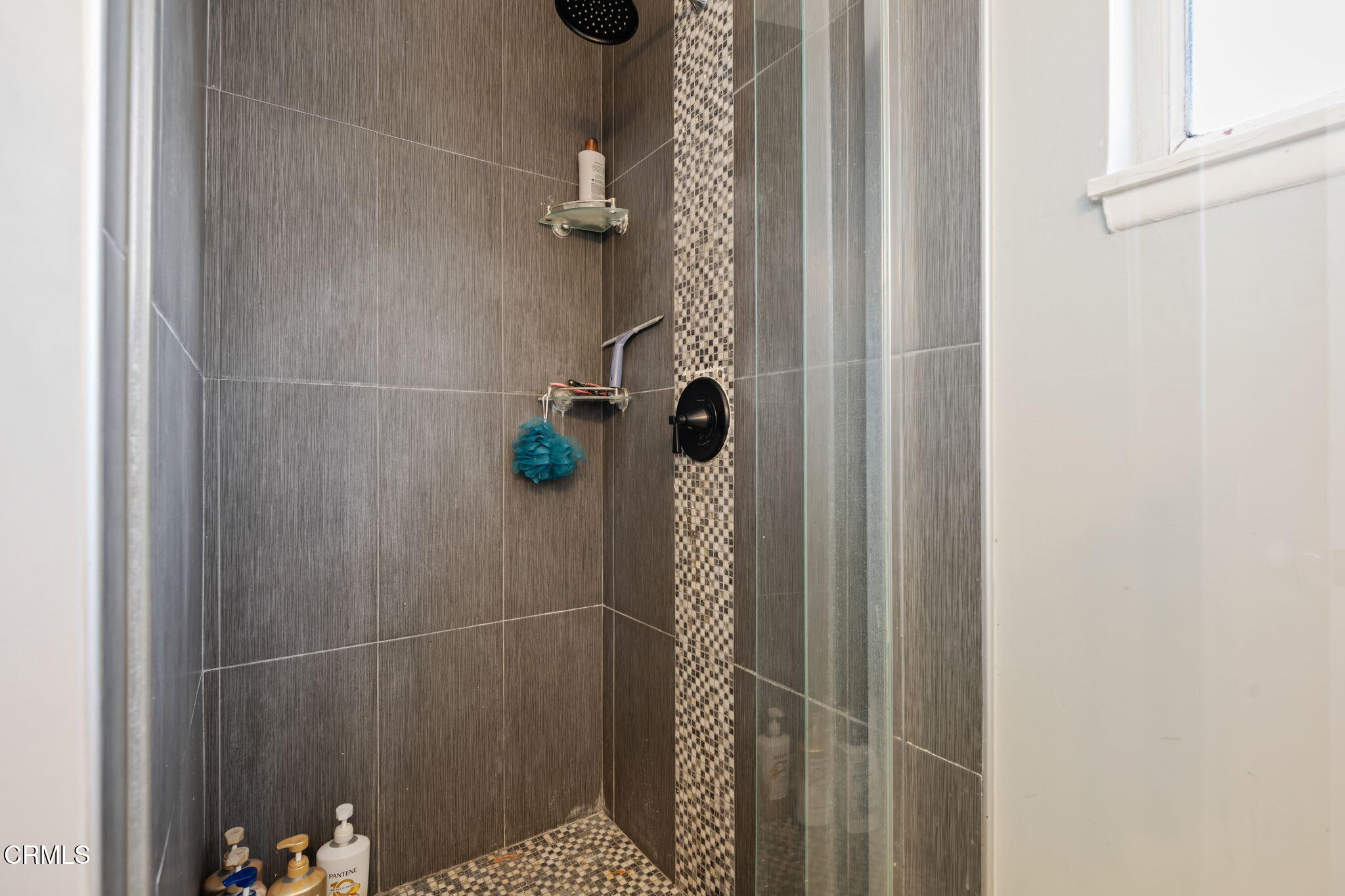 3050 Jackson Street Oxnard, CA 93033 - Photo 13 of 21 a bathroom with a shower