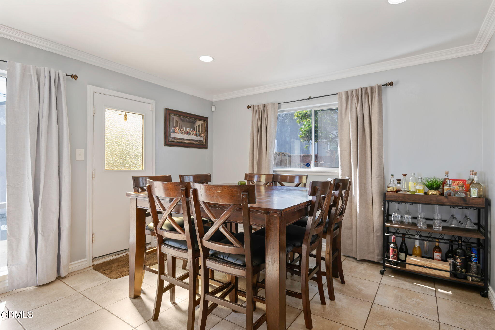 3050 Jackson Street Oxnard, CA 93033 - Photo 8 of 21 a view of a dining room with furniture and window