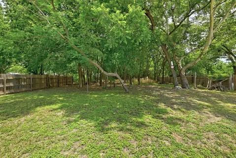 a view of outdoor space with deck and yard