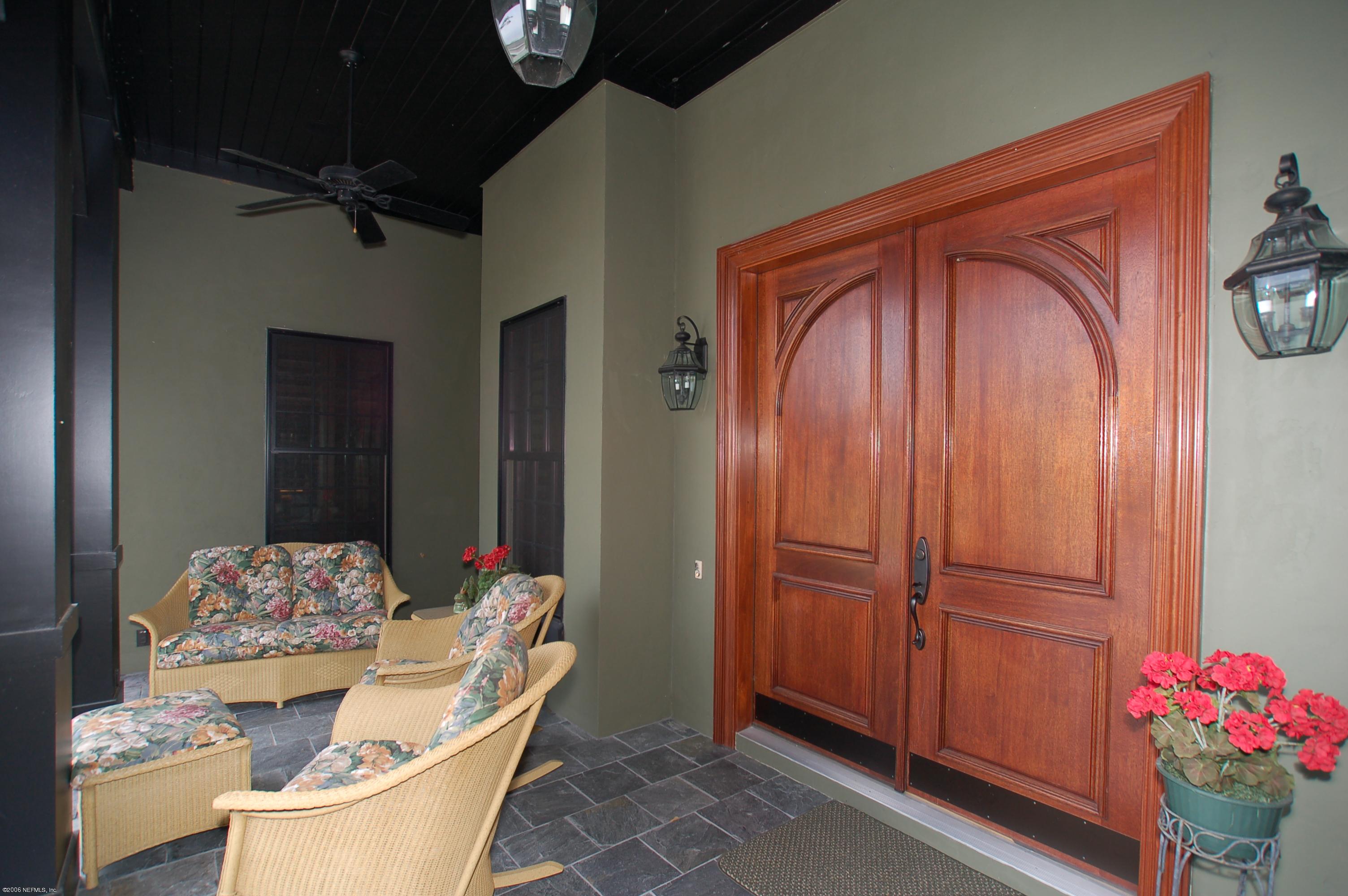 1701 Margarets Walk Road Fleming Island, FL 32003 - Photo 3 of 23 a dining room with furniture and wooden floor