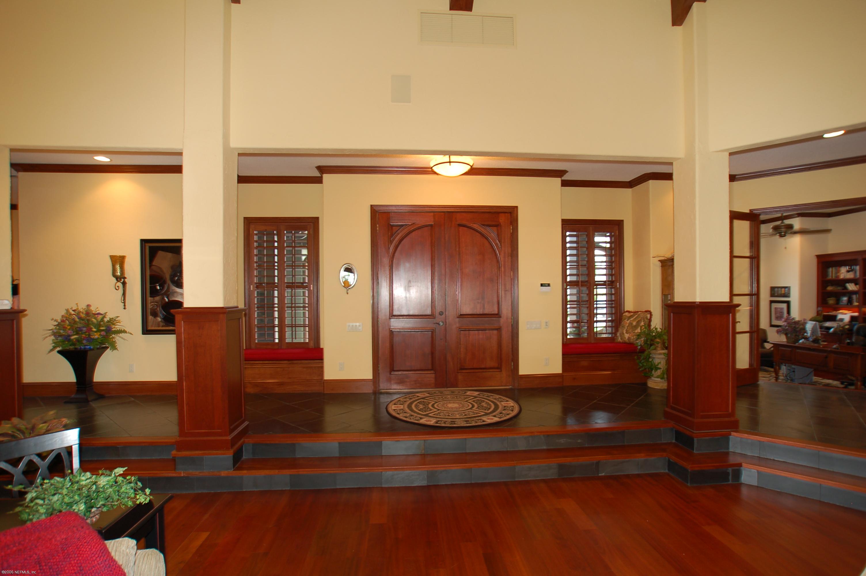1701 Margarets Walk Road Fleming Island, FL 32003 - Photo 4 of 23 a lobby with furniture and wooden floor