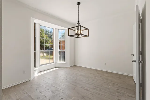 an empty room with windows