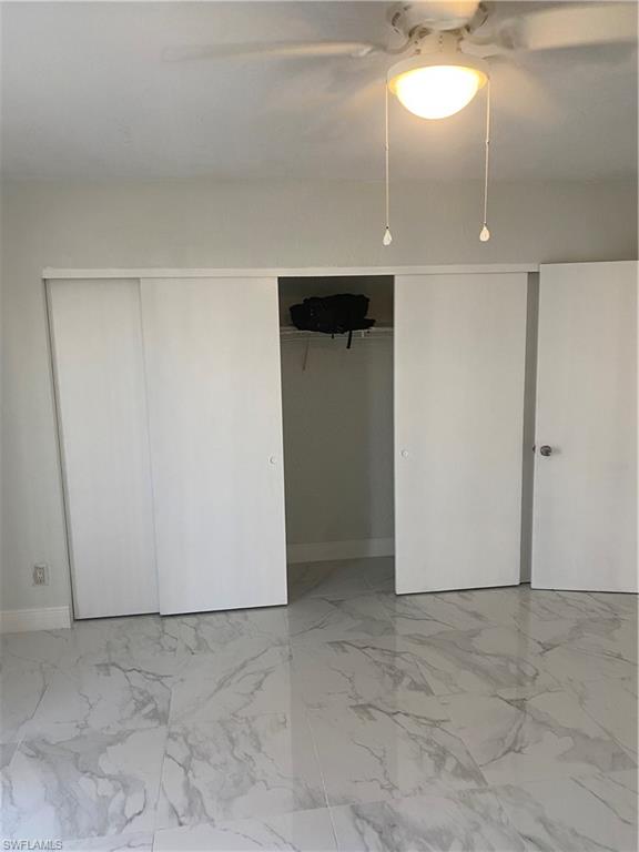 830 Wiggins Pass Road, Unit 10 Naples, FL 34110 - Photo 5 of 6 a view of an empty room