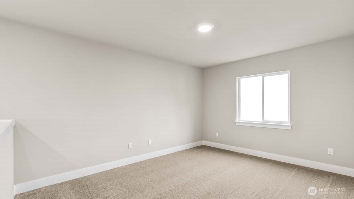 3125 194th Street Southeast Bothell, WA 98012 - Photo 12 of 25 an empty room with a window