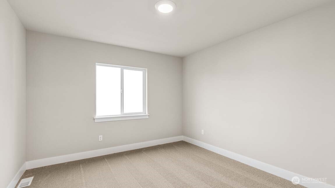 3125 194th Street Southeast Bothell, WA 98012 - Photo 13 of 25 an empty room with a window