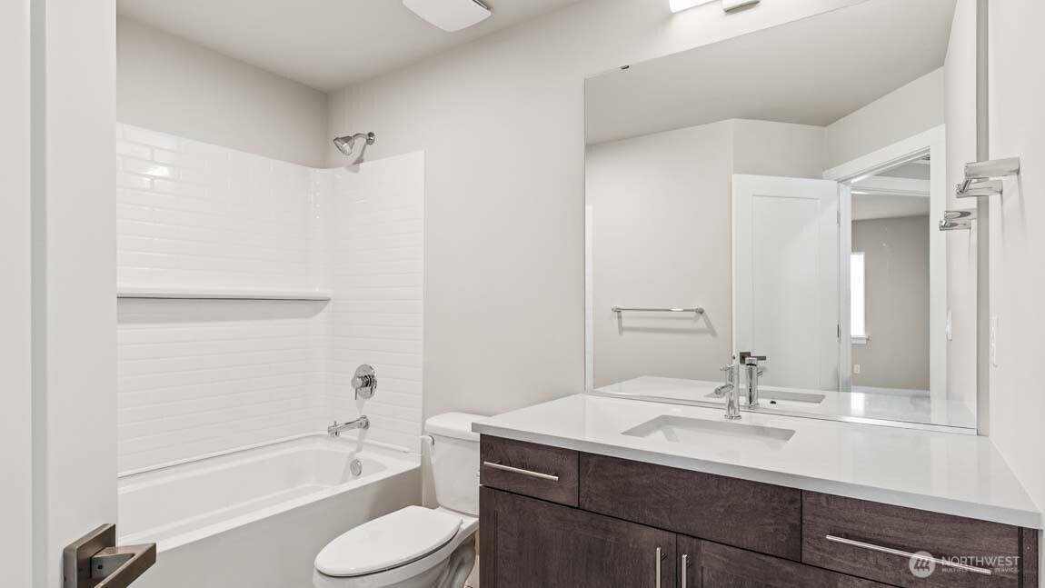 3125 194th Street Southeast Bothell, WA 98012 - Photo 14 of 25 a bathroom with a sink toilet tub and shower