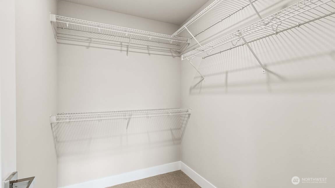 3125 194th Street Southeast Bothell, WA 98012 - Photo 23 of 25 a view of a room with racks on the wall