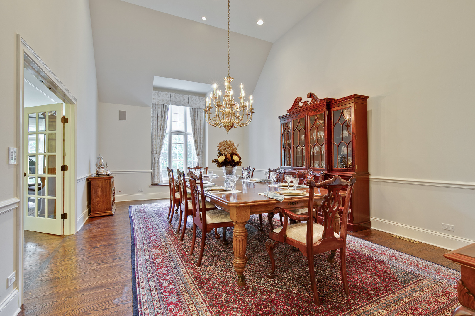 433 South Ridge Road Lake Forest, IL 60045 - Photo 12 of 49 a view of a dining room with furniture and wooden floor