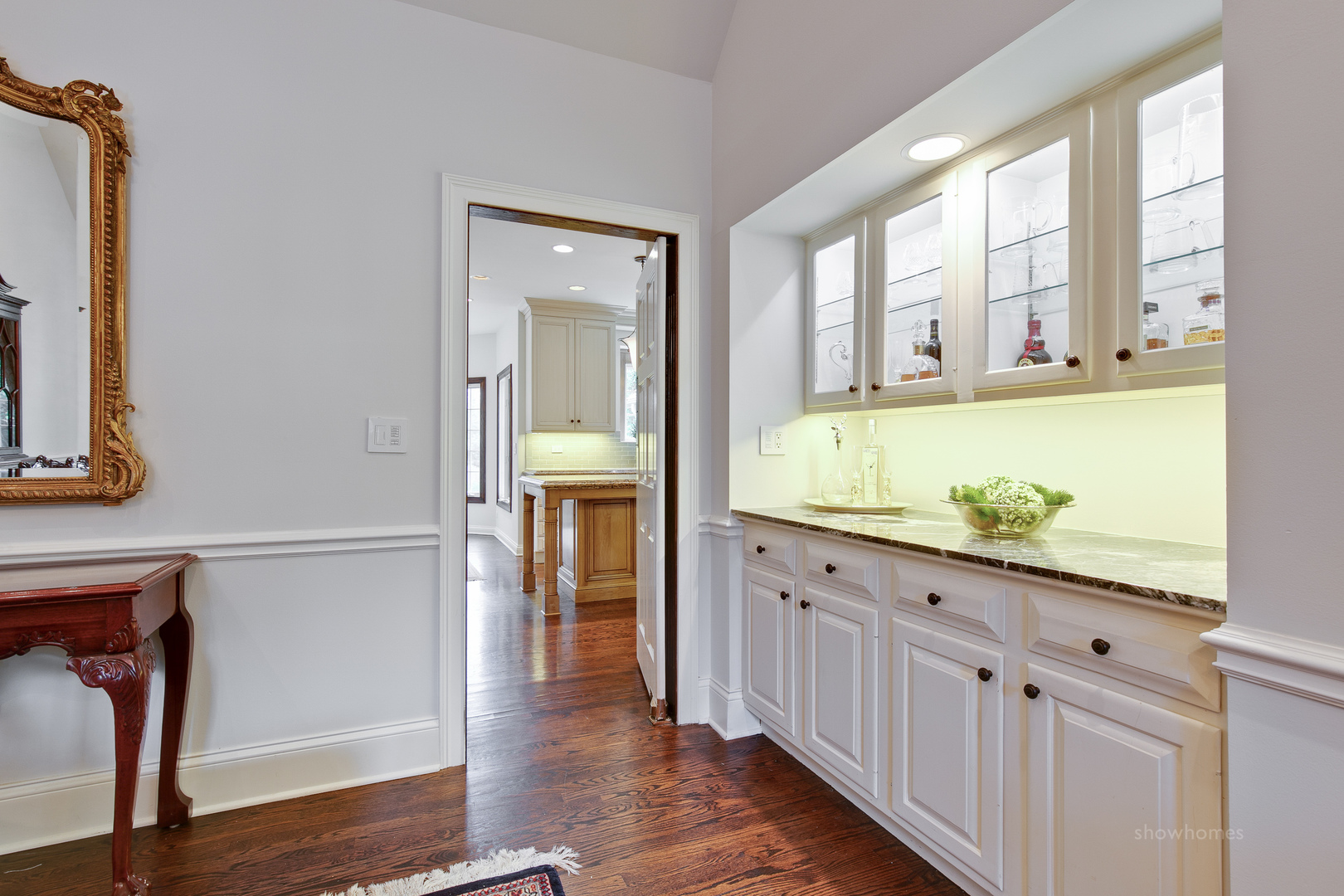 433 South Ridge Road Lake Forest, IL 60045 - Photo 13 of 49 a bathroom with granite countertop a sink and a large mirror