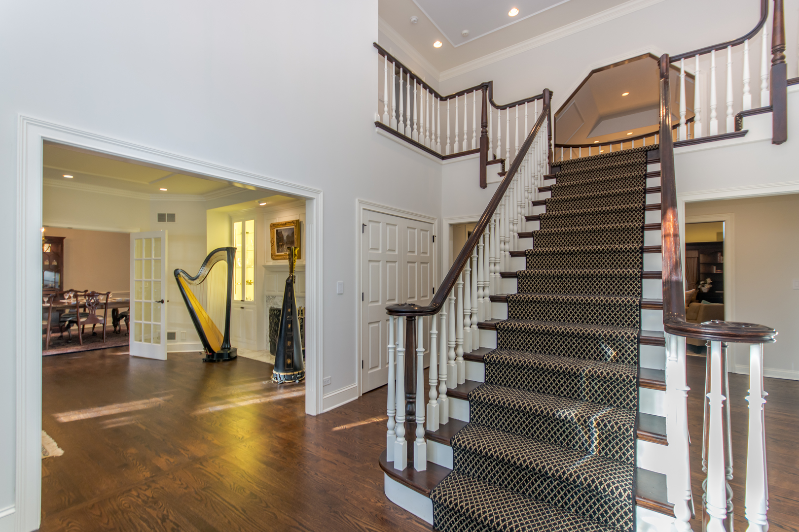 433 South Ridge Road Lake Forest, IL 60045 - Photo 3 of 49 a view of entryway and hall with wooden floor