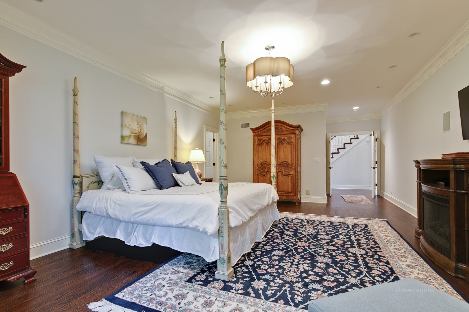 433 South Ridge Road Lake Forest, IL 60045 - Photo 21 of 49 a bedroom with a bed and wooden floor