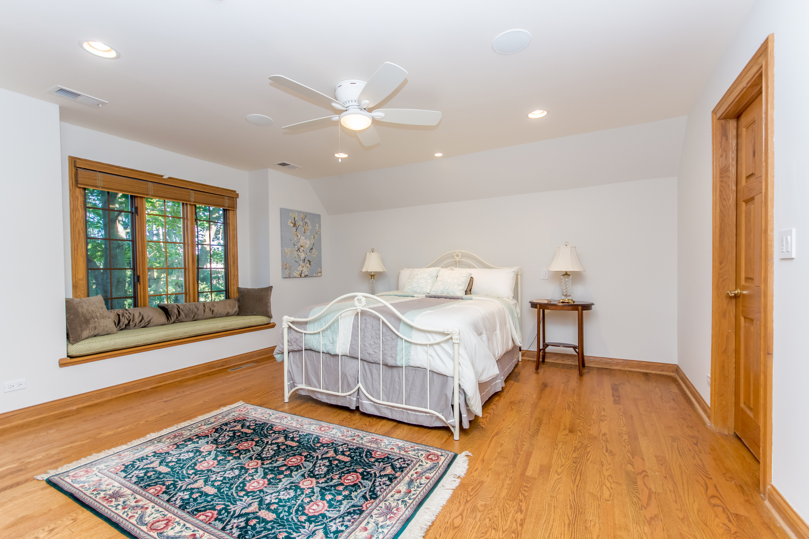 433 South Ridge Road Lake Forest, IL 60045 - Photo 29 of 49 a bedroom with a bed and a large window