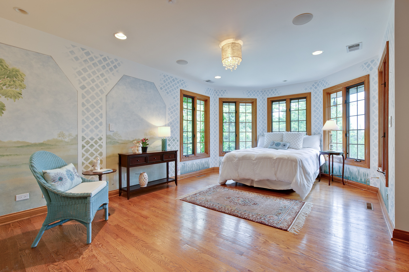 433 South Ridge Road Lake Forest, IL 60045 - Photo 35 of 49 a spacious bedroom with a bed and a large window