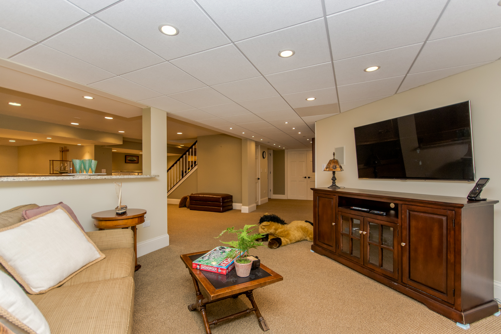 433 South Ridge Road Lake Forest, IL 60045 - Photo 39 of 49 a living room with furniture and a flat screen tv