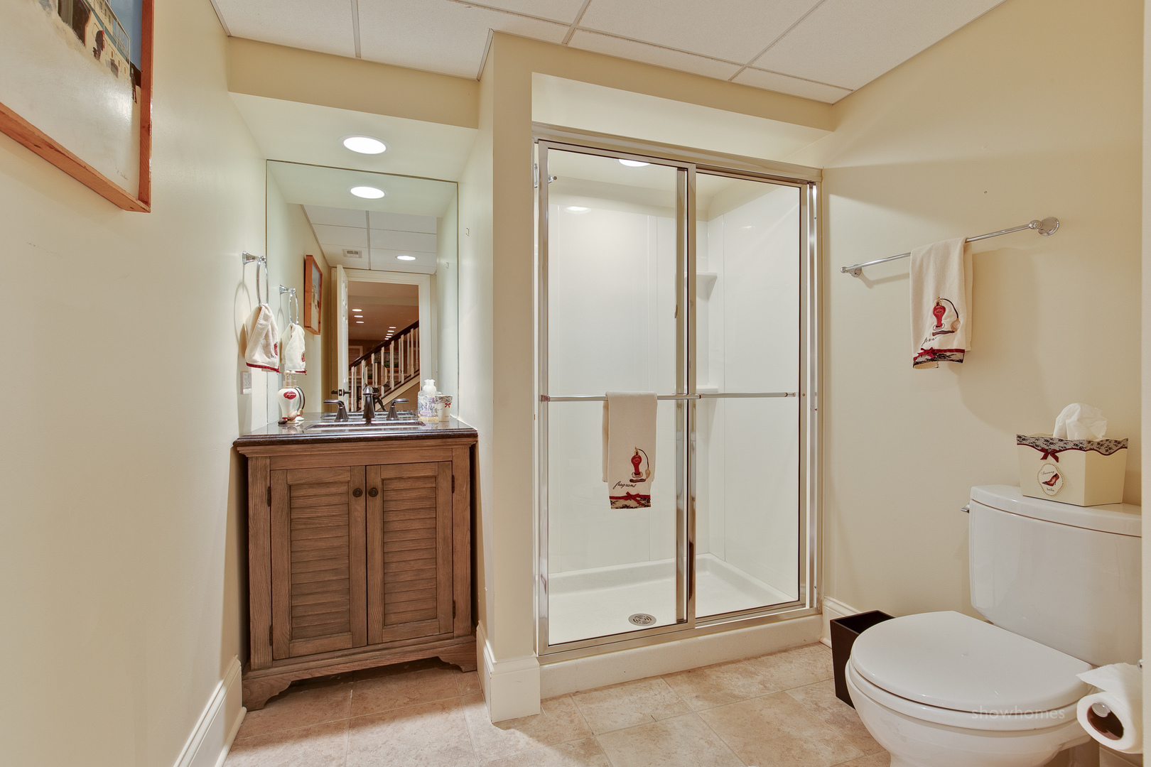 433 South Ridge Road Lake Forest, IL 60045 - Photo 41 of 49 a bathroom with a toilet sink and mirror