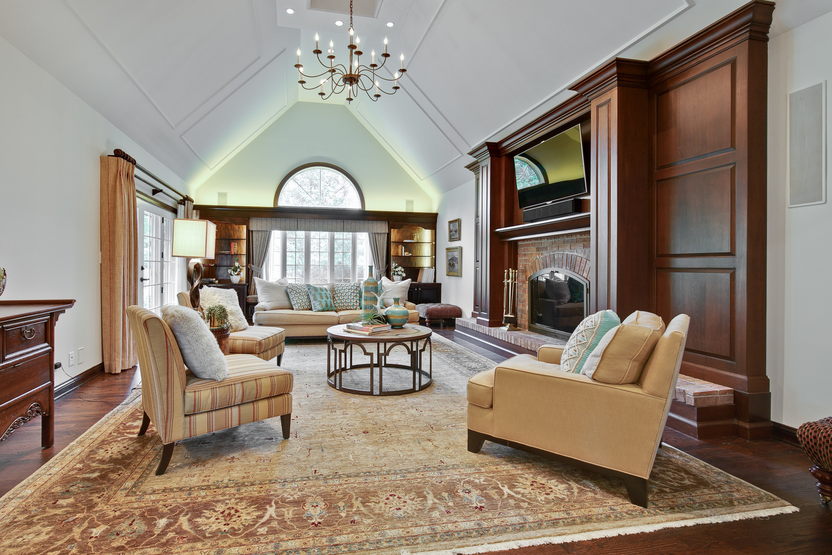 433 South Ridge Road Lake Forest, IL 60045 - Photo 8 of 49 a living room with furniture a fireplace and a floor to ceiling window
