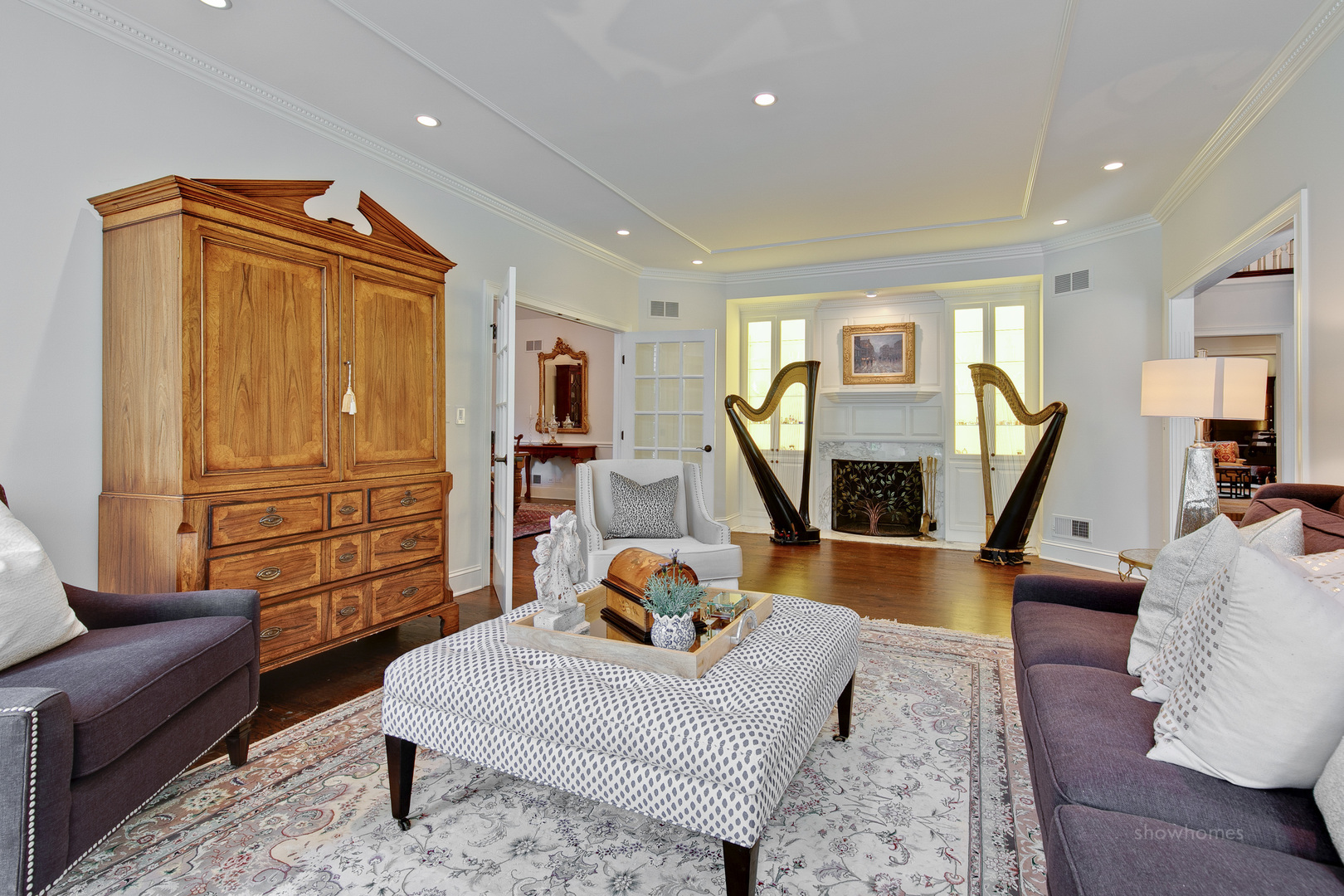 433 South Ridge Road Lake Forest, IL 60045 - Photo 9 of 49 a living room with furniture stairs and a wooden floor