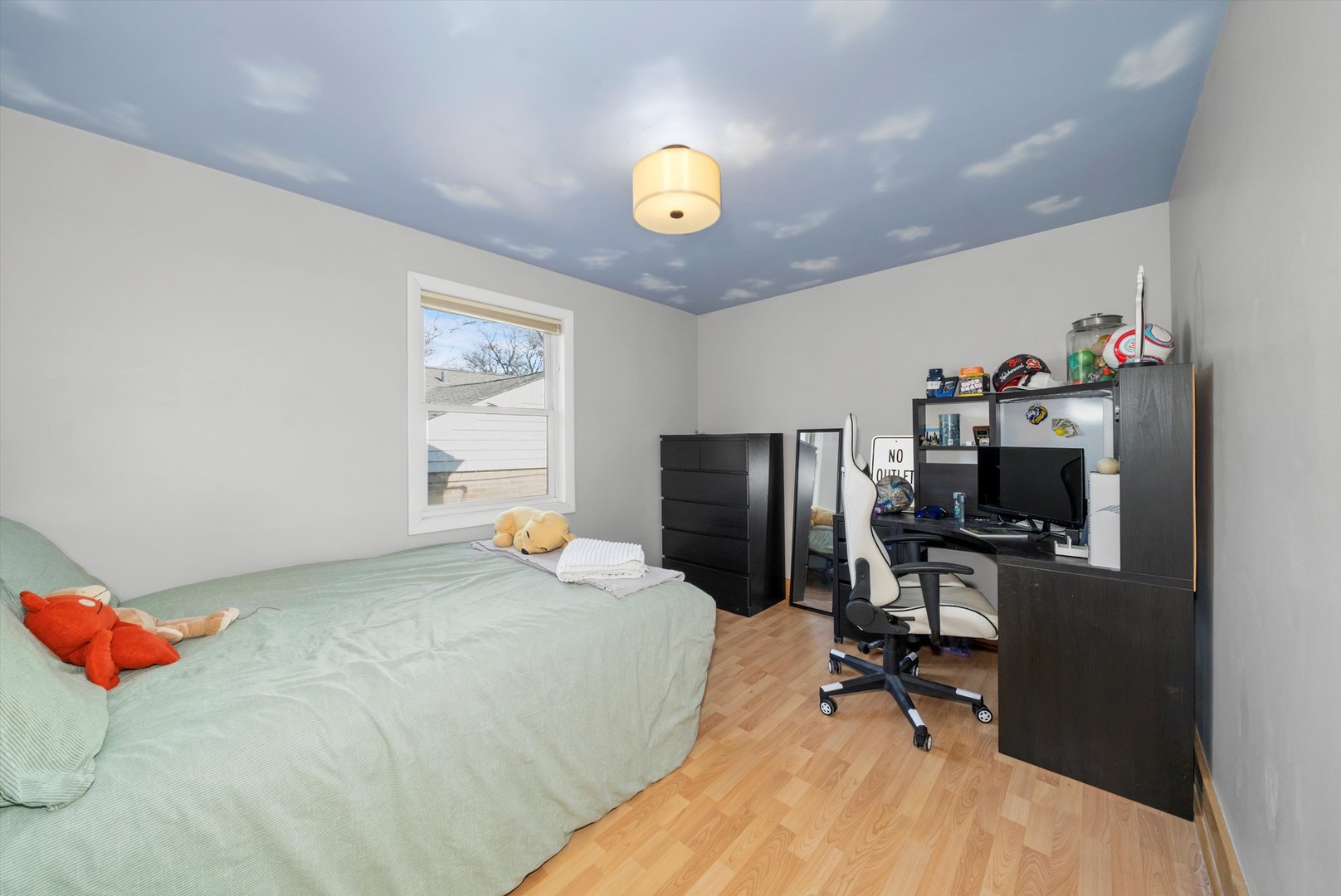735 Forest Road La Grange Park, IL 60526 - Photo 13 of 31 a bedroom with a bed and a flat screen tv