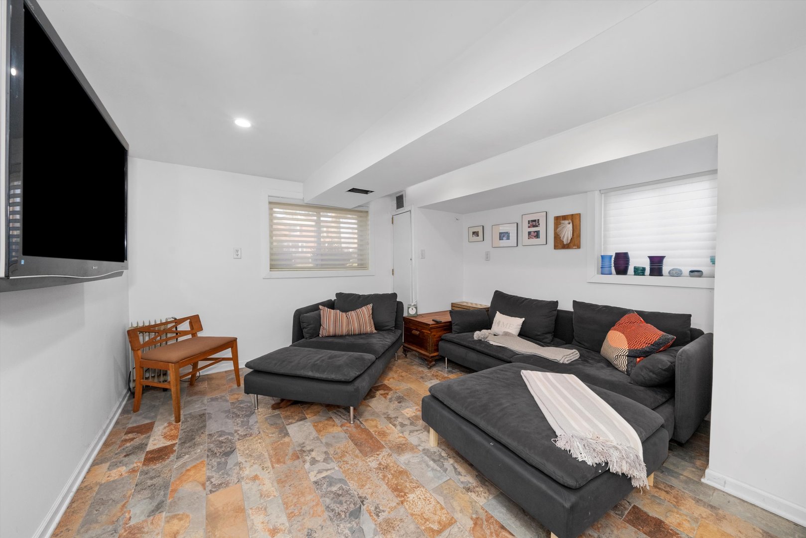 735 Forest Road La Grange Park, IL 60526 - Photo 15 of 31 a living room with furniture and a flat screen tv