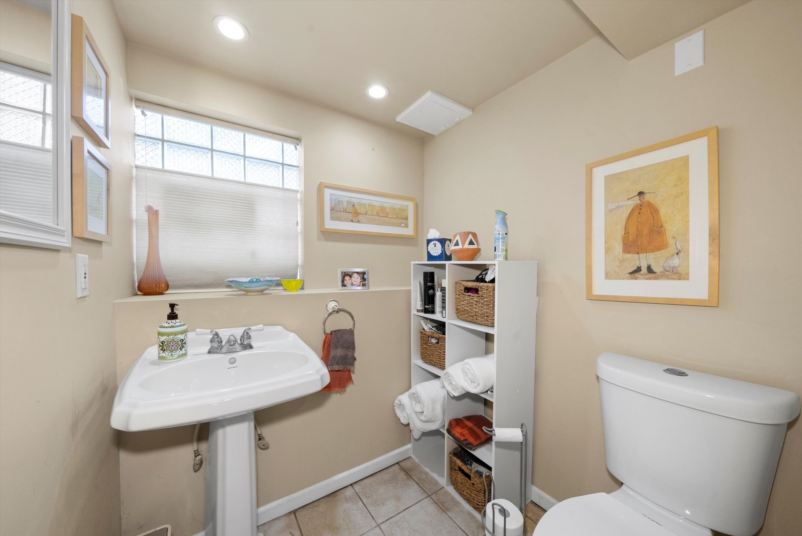 735 Forest Road La Grange Park, IL 60526 - Photo 17 of 31 a bathroom with a sink toilet and a mirror