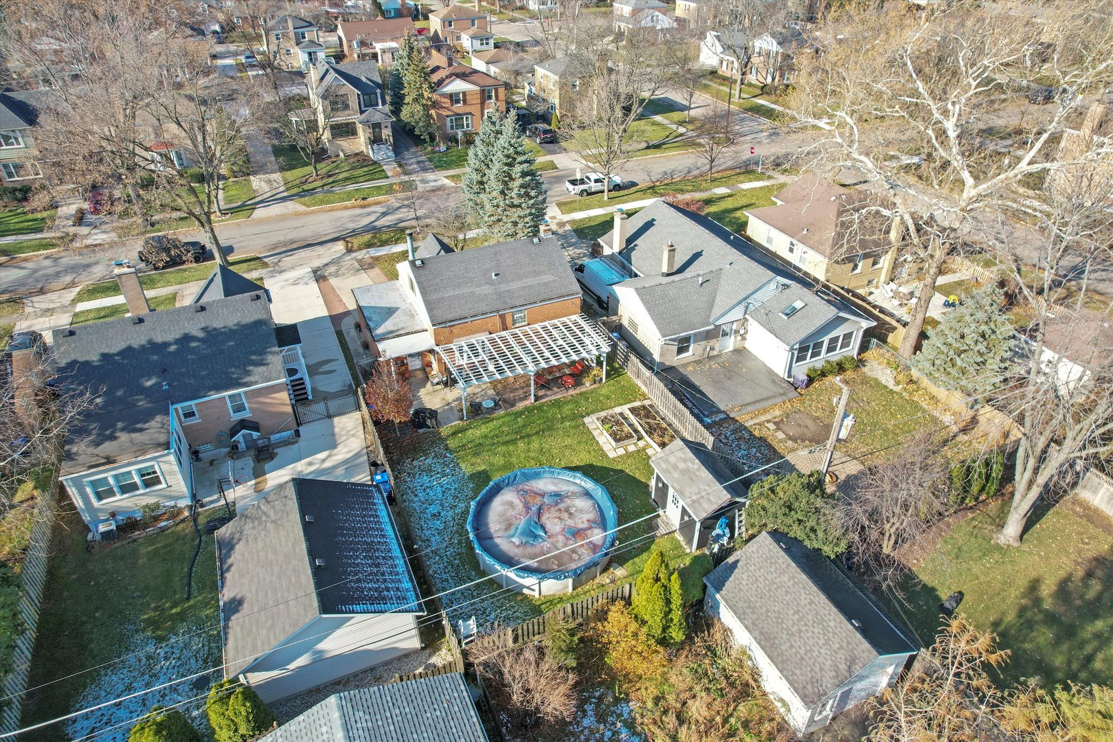 735 Forest Road La Grange Park, IL 60526 - Photo 25 of 31 an aerial view of a house with swimming pool and outdoor space