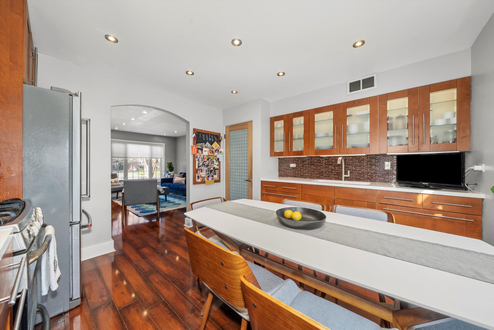 735 Forest Road La Grange Park, IL 60526 - Photo 9 of 31 a living room with furniture a flat screen tv and a large window