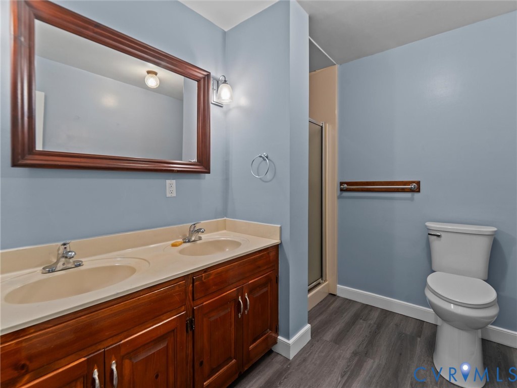 3420 State Rte 656 Powhatan, VA 23139 - Photo 25 of 37 a bathroom with a toilet sink and mirror