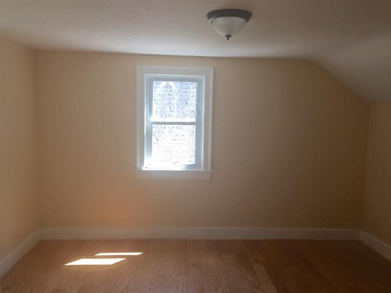 129 Spring Street Hyannis, MA 02601 - Photo 12 of 31 an empty room with a window