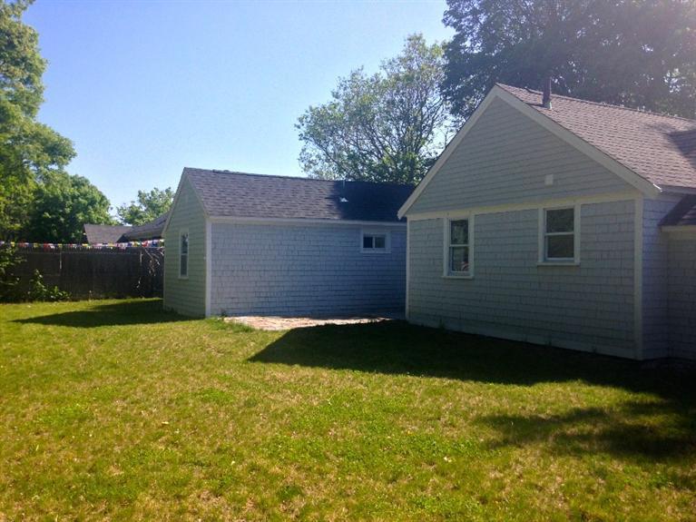 129 Spring Street Hyannis, MA 02601 - Photo 31 of 31 a backyard of a house