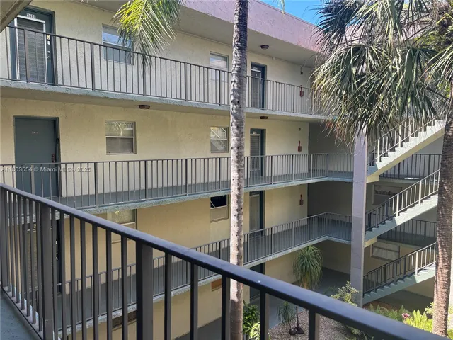 a view of balcony with a deck