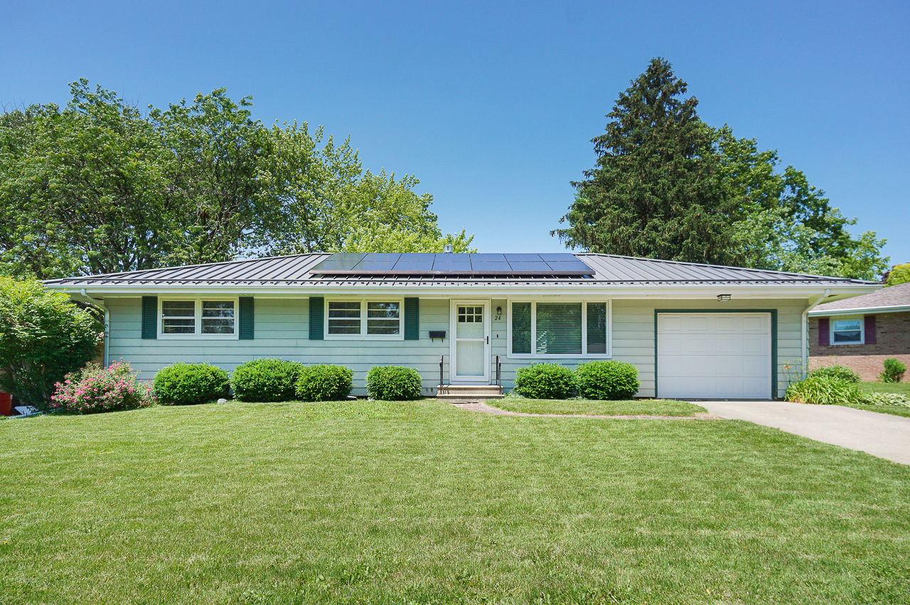 24 Ardith Drive Normal, IL 61761 - Photo 1 of 30 a front view of a house with a garden