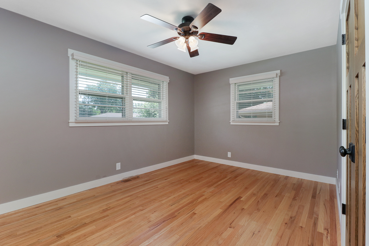 24 Ardith Drive Normal, IL 61761 - Photo 12 of 30 a view of room with window ceiling fan and hardwood floor