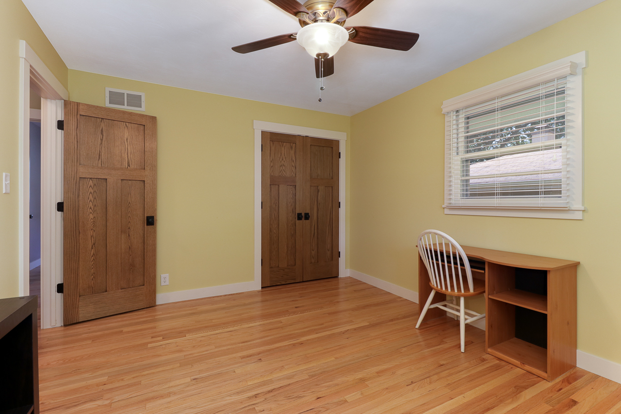 24 Ardith Drive Normal, IL 61761 - Photo 17 of 30 a view of room with wooden floor and workspace