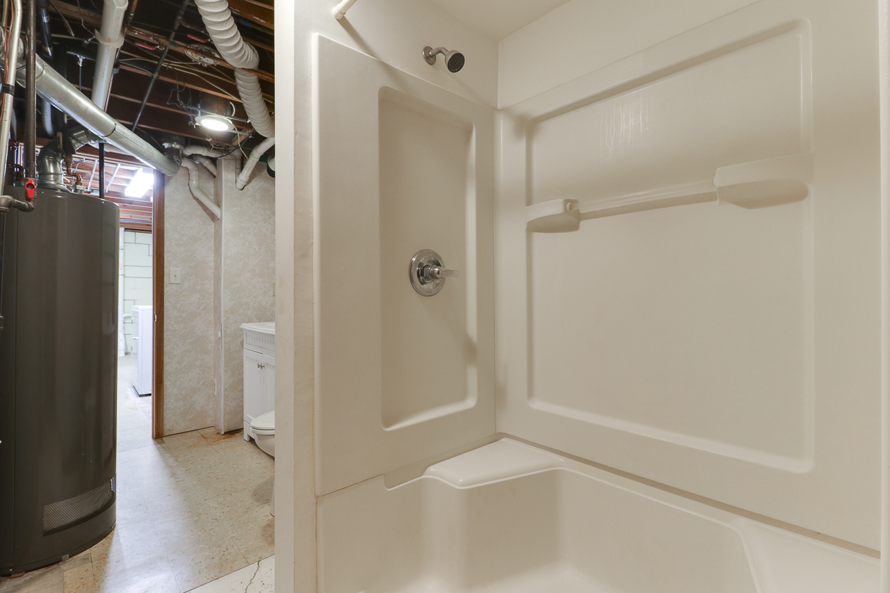 24 Ardith Drive Normal, IL 61761 - Photo 21 of 30 a bathroom with a shower