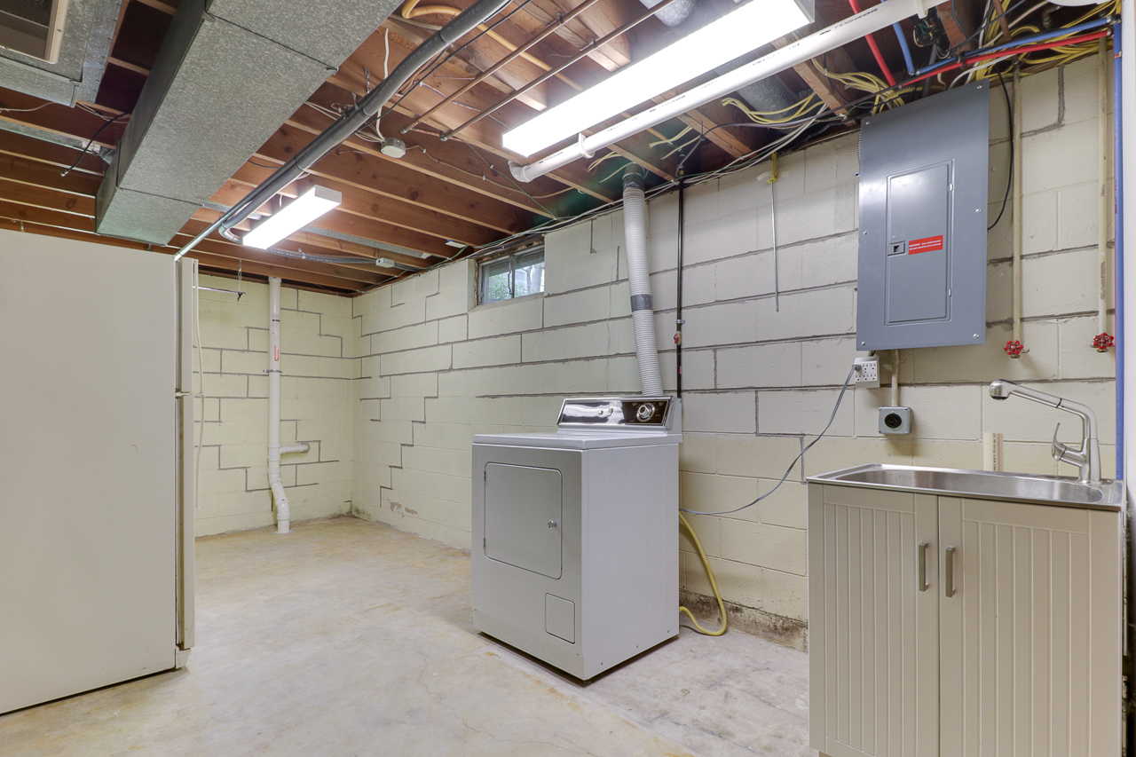 24 Ardith Drive Normal, IL 61761 - Photo 23 of 30 a utility room with cabinets