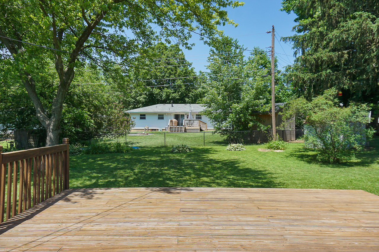 24 Ardith Drive Normal, IL 61761 - Photo 27 of 30 a view of a deck with a garden