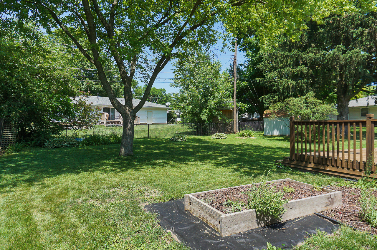 24 Ardith Drive Normal, IL 61761 - Photo 28 of 30 a view of backyard with swimming pool and green space