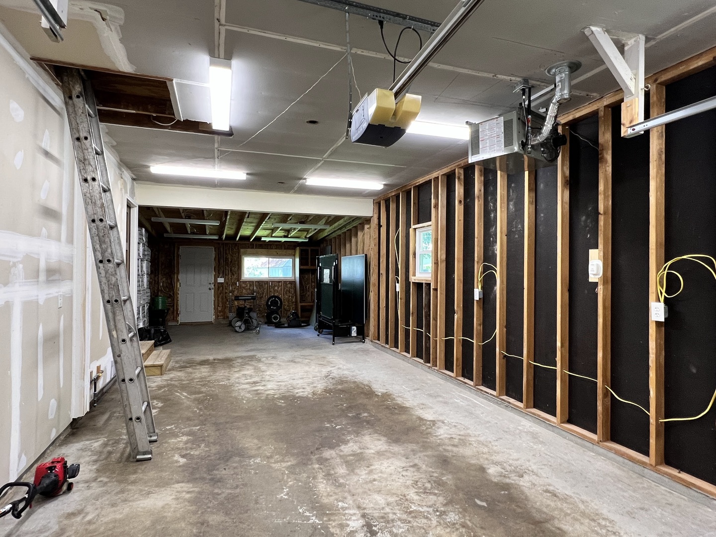 24 Ardith Drive Normal, IL 61761 - Photo 30 of 30 a view of a hallway with wooden walls and stairs