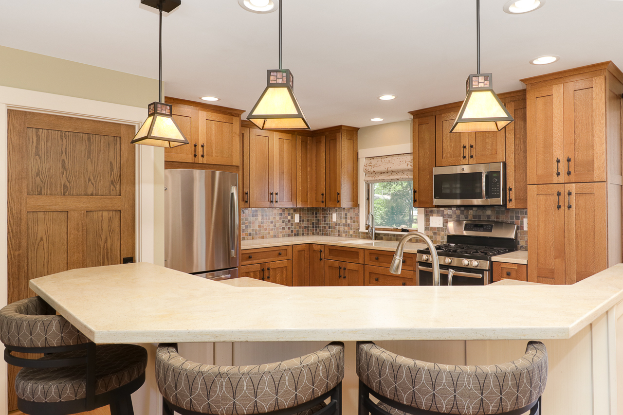 24 Ardith Drive Normal, IL 61761 - Photo 6 of 30 a kitchen with stainless steel appliances granite countertop a stove a refrigerator a oven a sink with a dining table and chairs