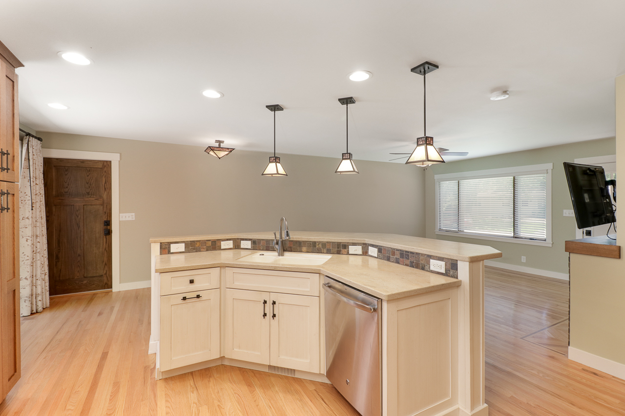 24 Ardith Drive Normal, IL 61761 - Photo 8 of 30 a kitchen that has a sink a stove and a wooden floor